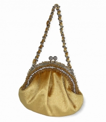 Sametová společenská kabelka ve tvaru váčku s ozdobným uchem v zlatožluté barvě.